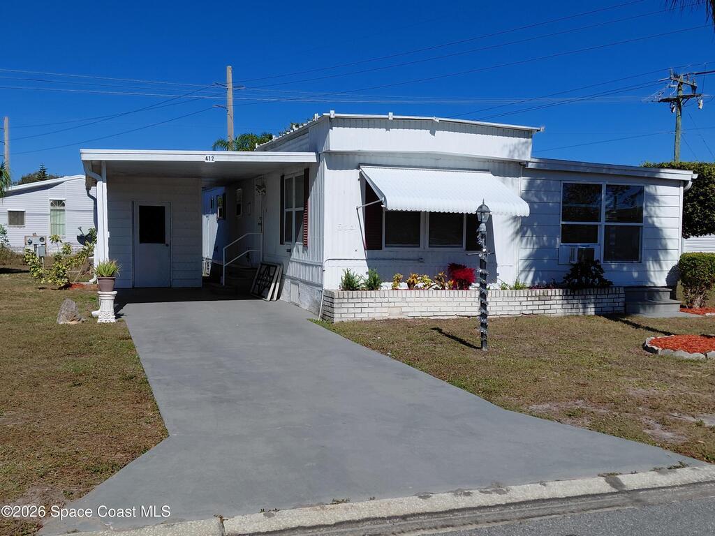 412 Osprey Drive, Barefoot Bay, FL 32976