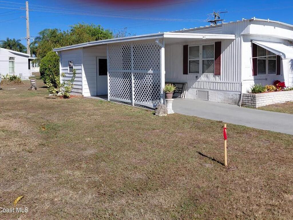 412 Osprey Drive, Barefoot Bay, FL 32976