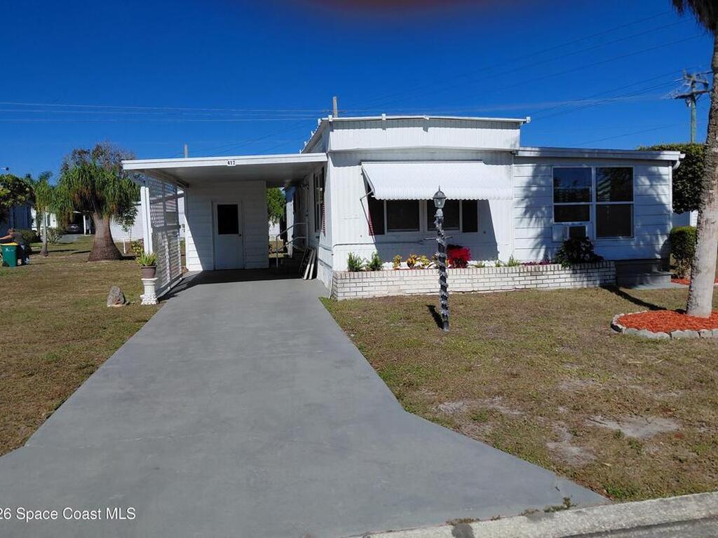 412 Osprey Drive, Barefoot Bay, FL 32976