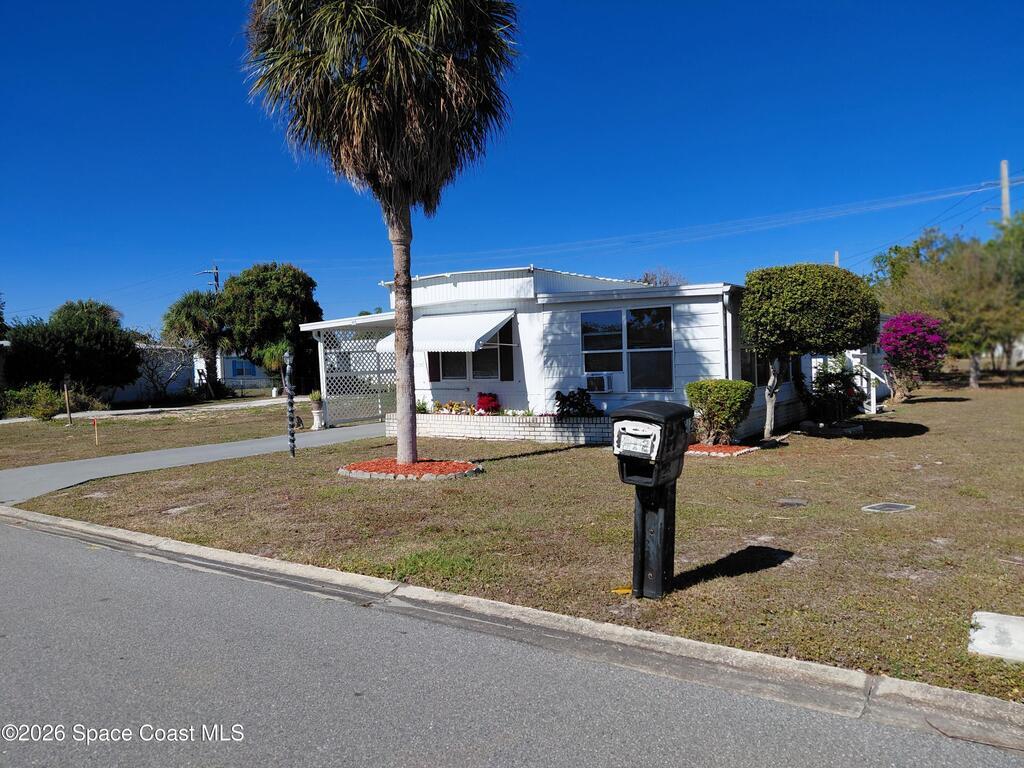 412 Osprey Drive, Barefoot Bay, FL 32976