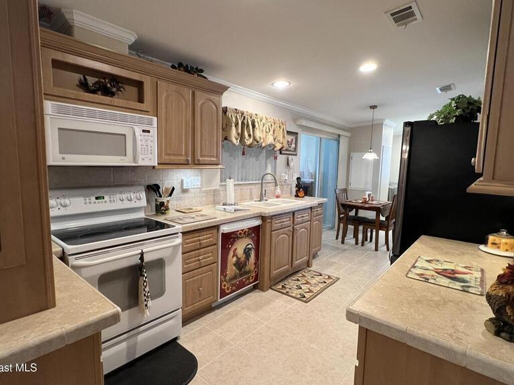 621 Puffin Drive, Barefoot Bay, FL 32976