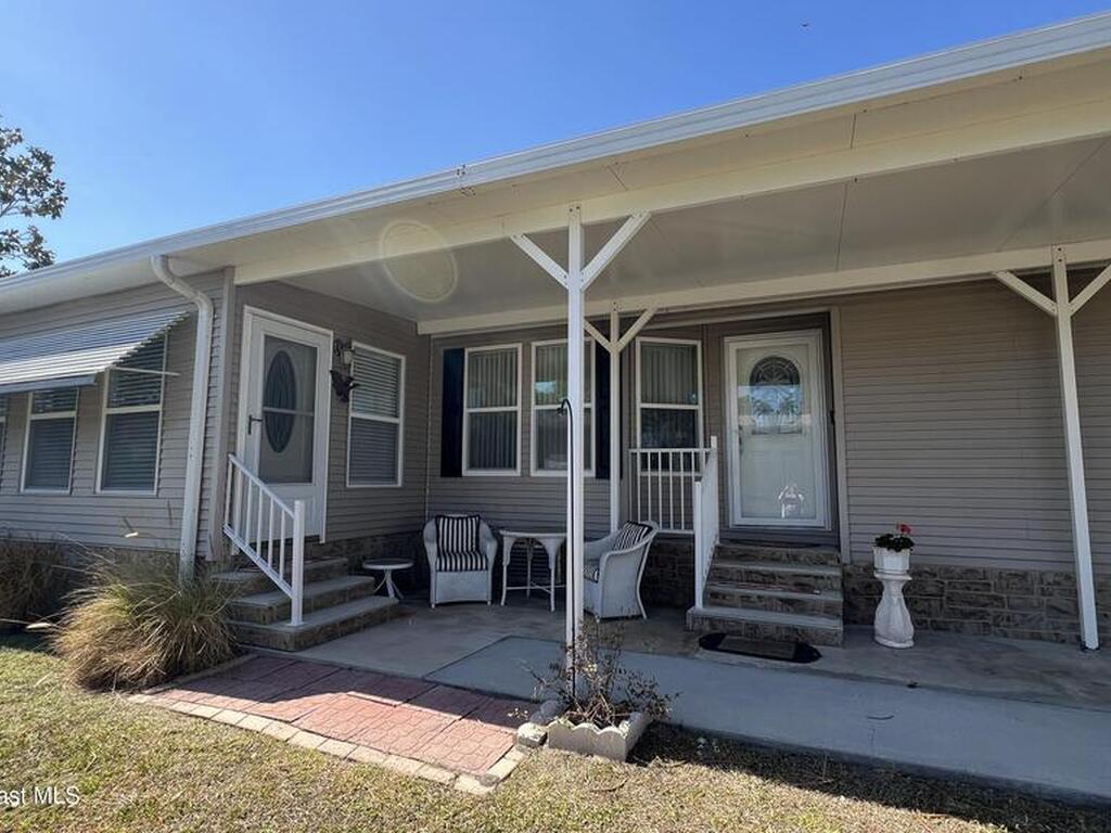 621 Puffin Drive, Barefoot Bay, FL 32976