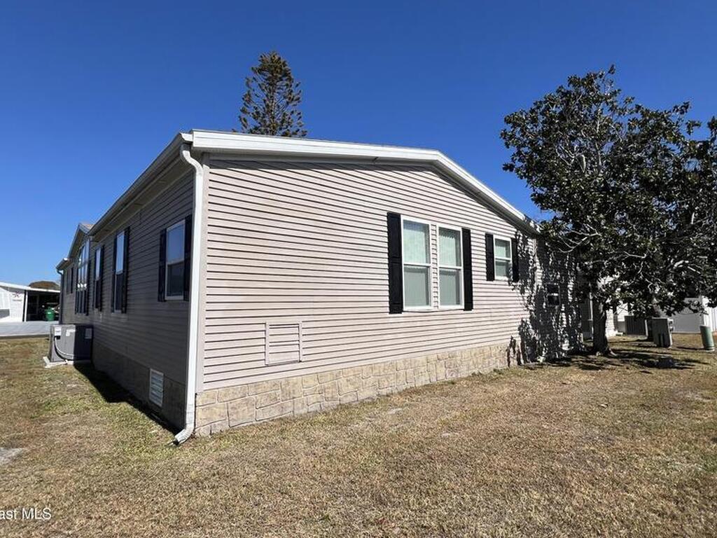 621 Puffin Drive, Barefoot Bay, FL 32976