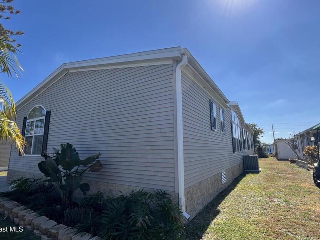 621 Puffin Drive, Barefoot Bay, FL 32976