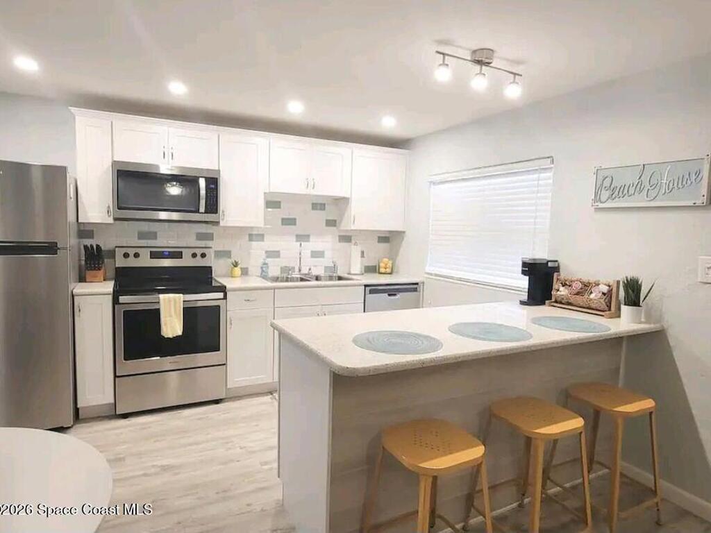 7605 Ridgewood Avenue, Cape Canaveral, FL 32920