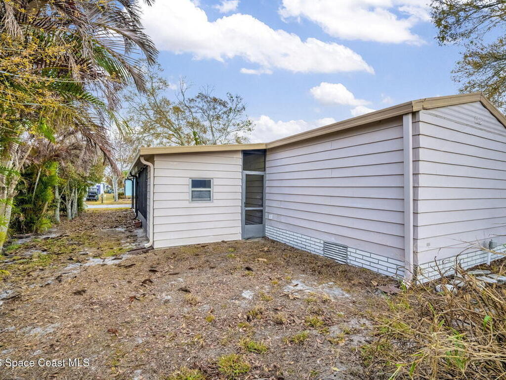 358 Dolphin Circle, Barefoot Bay, FL 32976