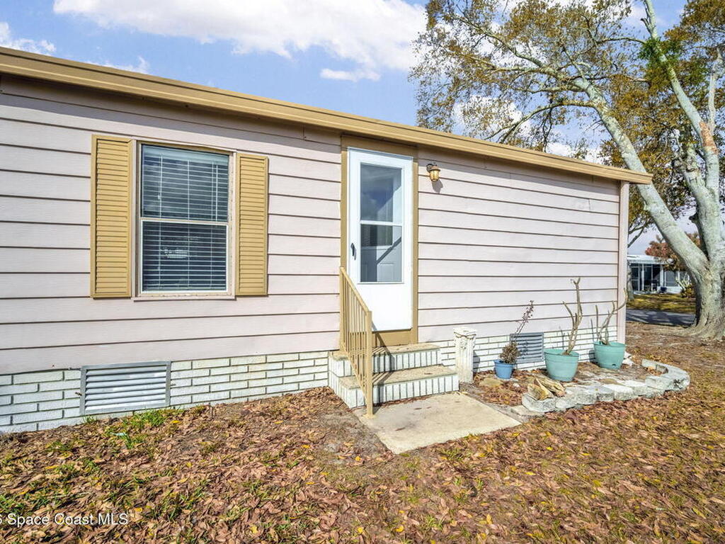 358 Dolphin Circle, Barefoot Bay, FL 32976