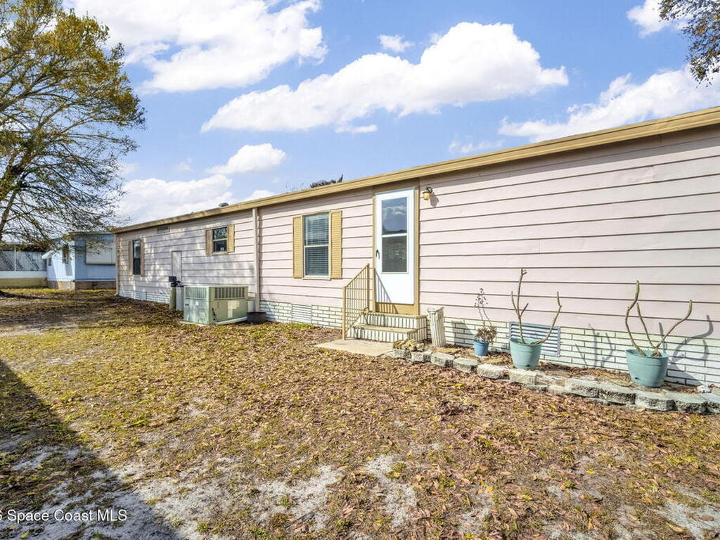 358 Dolphin Circle, Barefoot Bay, FL 32976