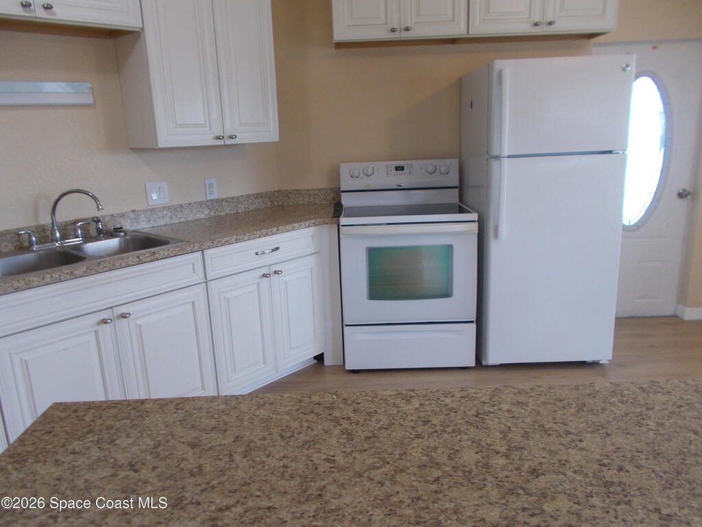 932 Cashew Circle, Barefoot Bay, FL 32976