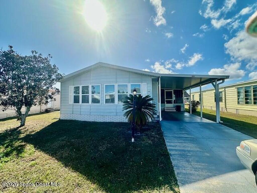 919 Jacaranda Drive, Barefoot Bay, FL 32976