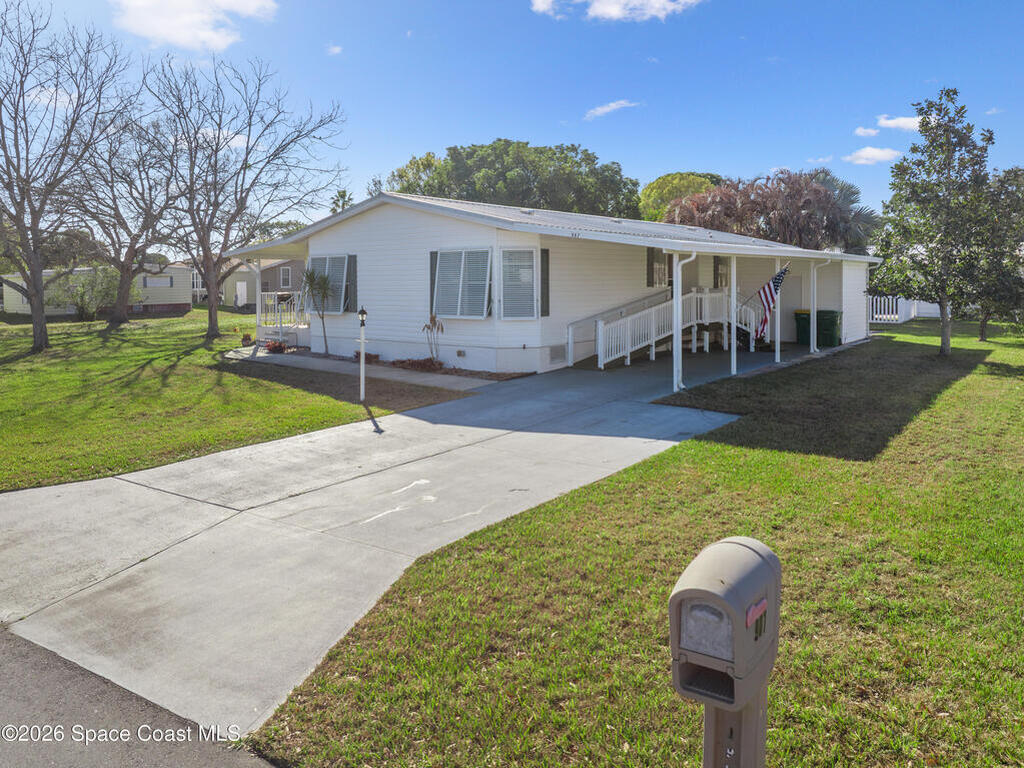 907 Yew Street, Barefoot Bay, FL 32976