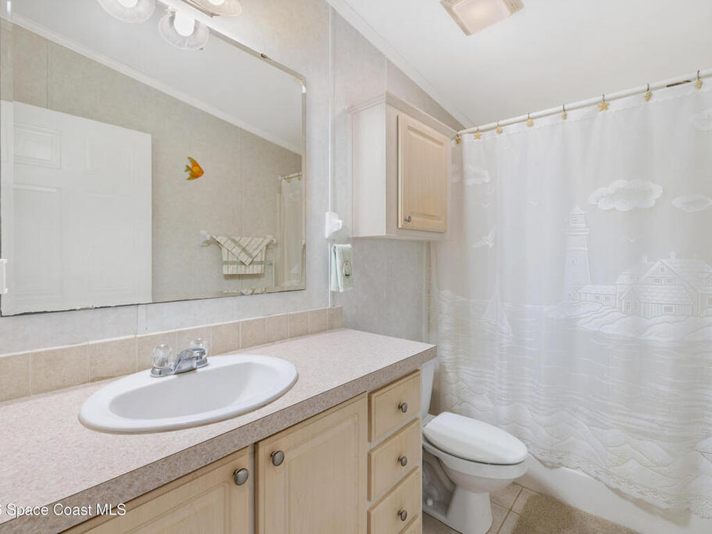 907 Yew Street, Barefoot Bay, FL 32976