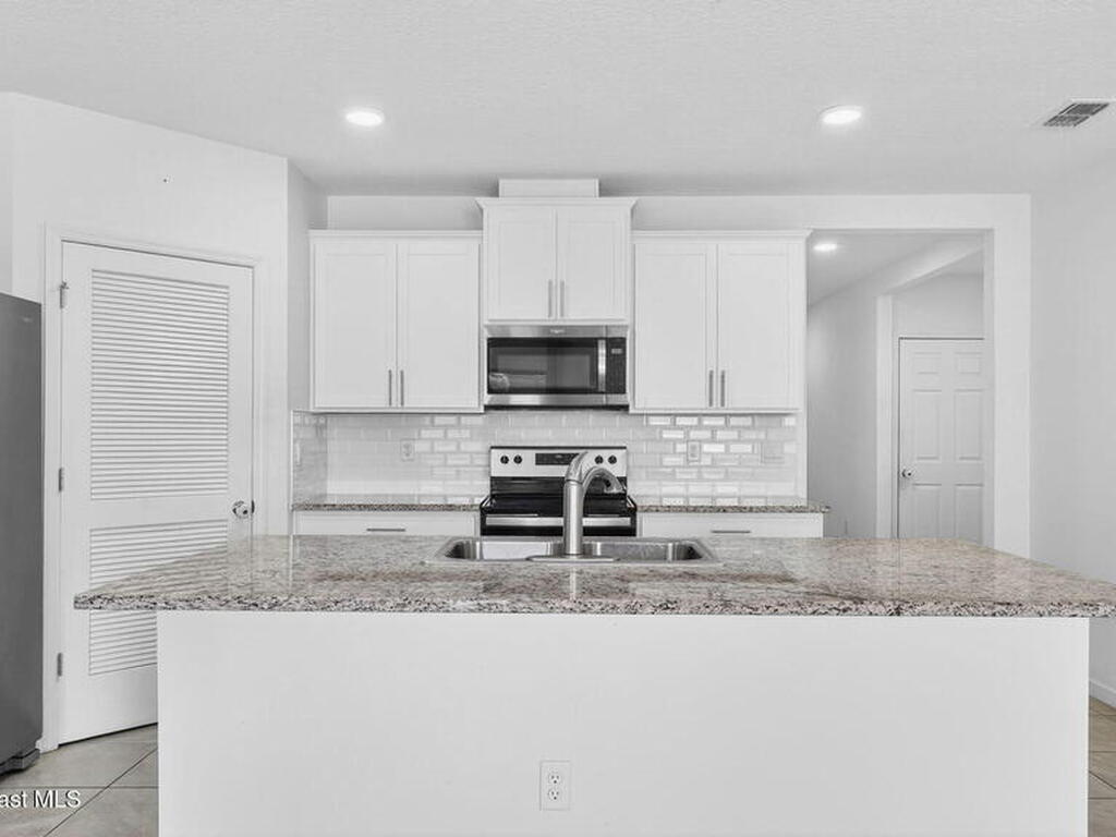 7114 Topaz Drive, Grant-Valkaria, FL 32949