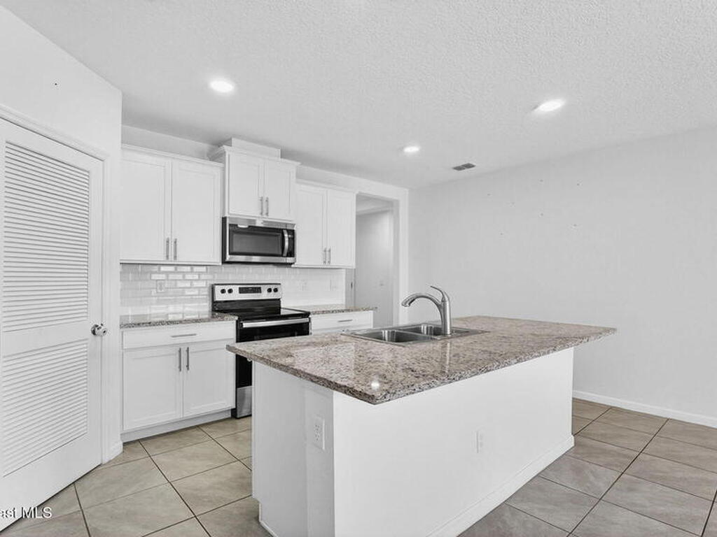 7114 Topaz Drive, Grant-Valkaria, FL 32949