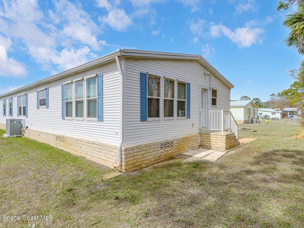 859 Tamarind Circle, Barefoot Bay, FL 32976