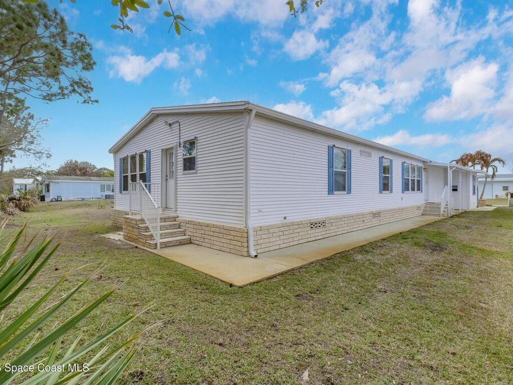 859 Tamarind Circle, Barefoot Bay, FL 32976